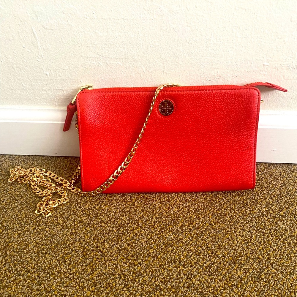 Tory Burch, small crossbody in bright orange red. 6 card slots inside.